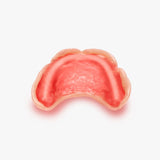 DinaBase7 wird auf Unterkiefer Zahnprothese aufgetragen